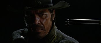 Movie still from “Jonah Hex” (2010), directed by Jimmy Hayward – A person wearing a cowboy hat; Close Up shot, Low angle