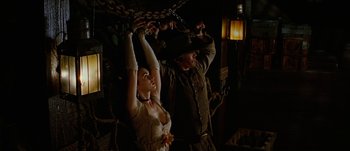 Movie still from “Jonah Hex” (2010), directed by Jimmy Hayward – A man and a woman chained to a chain; Medium shot, Low angle