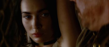 Movie still from “Jonah Hex” (2010), directed by Jimmy Hayward – A woman's face in the dark; Close Up shot, Over the shoulder angle