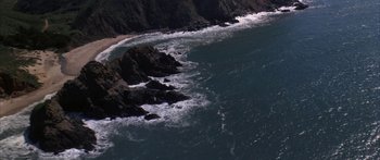 Movie still from “Jonathan Livingston Seagull” (1973), directed by Hall Bartlett – A body of water that has some water on it; Extreme Wide shot, High angle