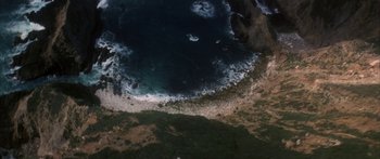 Movie still from “Jonathan Livingston Seagull” (1973), directed by Hall Bartlett – An aerial view of a body of water; Extreme Wide shot, Overhead angle