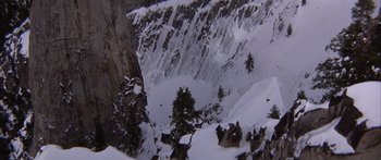 Movie still from “Jonathan Livingston Seagull” (1973), directed by Hall Bartlett – A view of a mountain from a distance; Extreme Wide shot, High angle