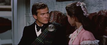 Movie still from “Journey to the Center of the Earth” (1959), directed by Henry Levin – A man and a woman are talking to each other; Medium shot, Over the shoulder angle