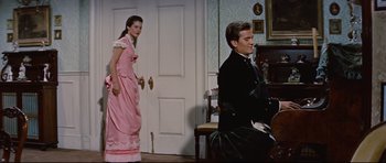 Movie still from “Journey to the Center of the Earth” (1959), directed by Henry Levin – A man and a woman dressed in period clothing; Medium shot, Low angle