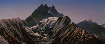 Movie still from “Journey to the Center of the Earth” (1959), directed by Henry Levin – A painting of a mountain range with snow on it's side; Extreme Wide shot, High angle