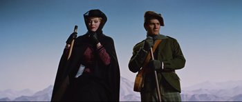 Movie still from “Journey to the Center of the Earth” (1959), directed by Henry Levin – A man and a woman dressed in medieval clothing; Medium shot, Low angle