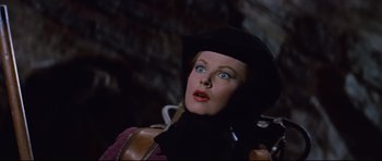 Movie still from “Journey to the Center of the Earth” (1959), directed by Henry Levin – A person wearing a hat; Close Up shot, Low angle