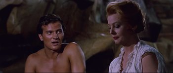 Movie still from “Journey to the Center of the Earth” (1959), directed by Henry Levin – A man and a woman are talking to each other; Close Up shot, Over the shoulder angle
