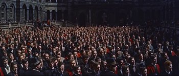 Movie still from “Journey to the Center of the Earth” (1959), directed by Henry Levin – A large group of men in suits and hats; Extreme Wide shot, High angle