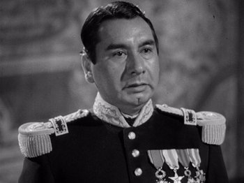 Movie still from “Juarez” (1939), directed by William Dieterle – An old photo of a man in a military uniform; Close Up shot, High angle
