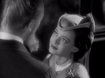 Movie still from “Juarez” (1939), directed by William Dieterle – A man and a woman are looking at one another; Close Up shot, Over the shoulder angle