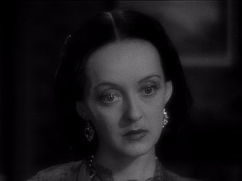 Movie still from “Juarez” (1939), directed by William Dieterle – A black - and - white photo of a woman in a dress; Close Up shot, High angle