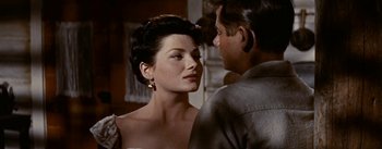 Movie still from “Jubal” (1956), directed by Delmer Daves – A man and a woman looking at one another; Close Up shot, Over the shoulder angle