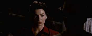 Movie still from “Jubal” (1956), directed by Delmer Daves – A person wearing a red shirt; Close Up shot, Over the shoulder angle