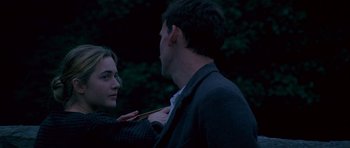 Movie still from “Jude” (1996), directed by Michael Winterbottom – A man and a woman are looking at each other; Close Up shot, Over the shoulder angle