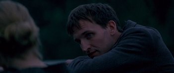 Movie still from “Jude” (1996), directed by Michael Winterbottom – A person looking at the camera; Close Up shot, Over the shoulder angle