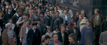 Movie still from “Jude” (1996), directed by Michael Winterbottom – A large group of people are gathered together; Wide shot, High angle