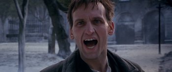 Movie still from “Jude” (1996), directed by Michael Winterbottom – A person with mouth wide open; Close Up shot, Low angle