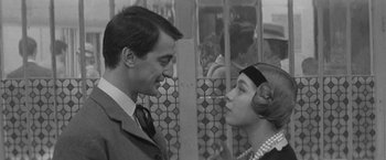 Movie still from “Jules and Jim” (1962), directed by François Truffaut – A man and a woman are looking at one another; Close Up shot, Over the shoulder angle