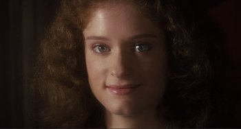 Movie still from “Julia” (1977), directed by Fred Zinnemann – A woman's face in a dimly - lit room; Close Up shot, High angle