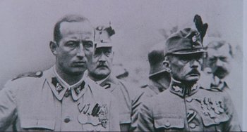 Movie still from “Julia” (1977), directed by Fred Zinnemann – A black and white photo of a group of men in military uniforms; Close Up shot, Low angle