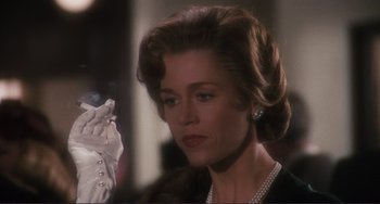 Movie still from “Julia” (1977), directed by Fred Zinnemann – A person wearing a dress; Close Up shot, Over the shoulder angle