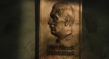 Movie still from “Julia” (1977), directed by Fred Zinnemann – A portrait of a man with a mustache; Extreme Close Up shot, High angle