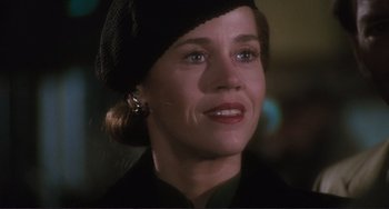 Movie still from “Julia” (1977), directed by Fred Zinnemann – A person wearing a hat; Close Up shot, Low angle