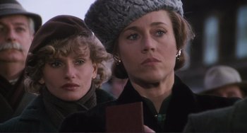 Movie still from “Julia” (1977), directed by Fred Zinnemann – Two women are standing next to each other; Close Up shot, Low angle