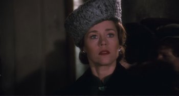 Movie still from “Julia” (1977), directed by Fred Zinnemann – A person wearing a hat; Close Up shot, Over the shoulder angle