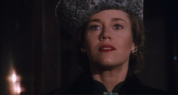 Movie still from “Julia” (1977), directed by Fred Zinnemann – A person wearing a hat; Close Up shot, Low angle