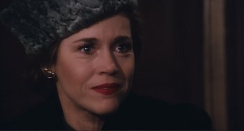 Movie still from “Julia” (1977), directed by Fred Zinnemann – A person wearing a hat; Close Up shot, Over the shoulder angle