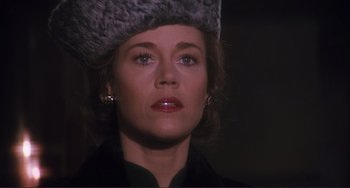 Movie still from “Julia” (1977), directed by Fred Zinnemann – A person wearing a fur hat; Close Up shot, Low angle