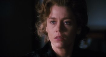 Movie still from “Julia” (1977), directed by Fred Zinnemann – A woman's face in the dark; Close Up shot, Over the shoulder angle