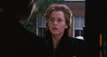 Movie still from “Julia” (1977), directed by Fred Zinnemann – A person wearing a black jacket; Close Up shot, Over the shoulder angle