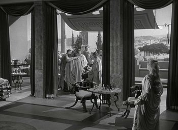 Movie still from “Julius Caesar” (1953), directed by Joseph L. Mankiewicz – A black and white photo of a group of people in ancient roman clothing; Extreme Wide shot, High angle