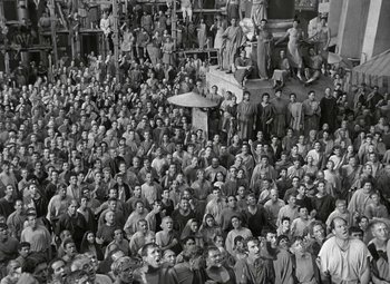 Movie still from “Julius Caesar” (1953), directed by Joseph L. Mankiewicz – A large group of people gathered together in a building; Extreme Wide shot, High angle