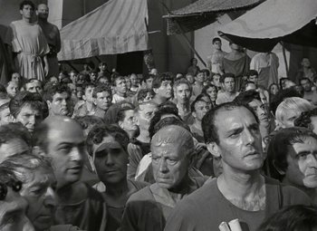 Movie still from “Julius Caesar” (1953), directed by Joseph L. Mankiewicz – A large group of people are gathered in a crowd; Wide shot, High angle