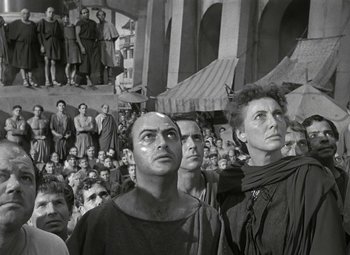 Movie still from “Julius Caesar” (1953), directed by Joseph L. Mankiewicz – A black and white photo of a crowd of people; Medium shot, Low angle