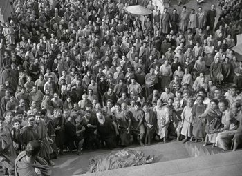 Movie still from “Julius Caesar” (1953), directed by Joseph L. Mankiewicz – A large group of people gathered together in a stadium; Extreme Wide shot, High angle