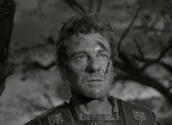 Movie still from “Julius Caesar” (1953), directed by Joseph L. Mankiewicz – Black and white photograph of a man in a military uniform; Close Up shot, Low angle