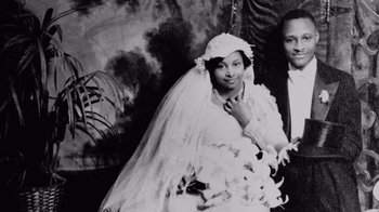 Movie still from “Jumping the Broom” (2011), directed by Salim Akil – An old black and white photo of a bride and groom; Close Up shot, High angle
