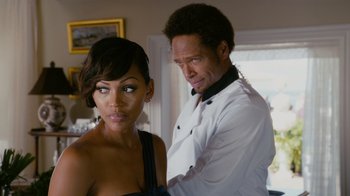 Movie still from “Jumping the Broom” (2011), directed by Salim Akil – A man and a woman are posing for a picture; Close Up shot, Over the shoulder angle