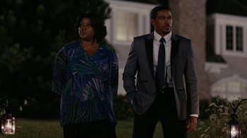 Movie still from “Jumping the Broom” (2011), directed by Salim Akil – A man and a woman standing next to each other; Medium shot, Over the shoulder angle