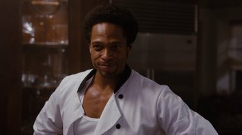 Movie still from “Jumping the Broom” (2011), directed by Salim Akil – A man wearing a white shirt and a black tie; Close Up shot, Over the shoulder angle