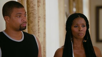 Movie still from “Jumping the Broom” (2011), directed by Salim Akil – A man and a woman standing next to each other; Close Up shot, Over the shoulder angle