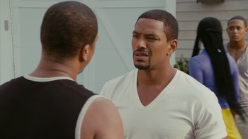 Movie still from “Jumping the Broom” (2011), directed by Salim Akil – Two men are standing outside talking to each other; Close Up shot, Over the shoulder angle