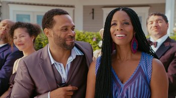 Movie still from “Jumping the Broom” (2011), directed by Salim Akil – A man and a woman posing for a picture; Close Up shot, Over the shoulder angle