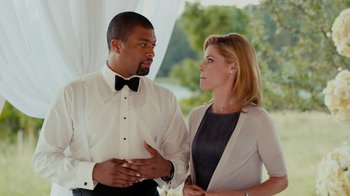 Movie still from “Jumping the Broom” (2011), directed by Salim Akil – A man and a woman standing next to each other; Medium shot, Over the shoulder angle