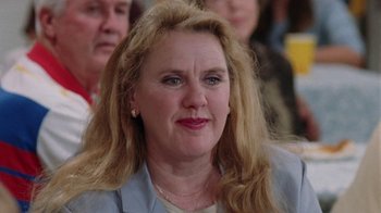 Movie still from “Junebug” (2005), directed by Phil Morrison – A person with long hair; Close Up shot, Low angle